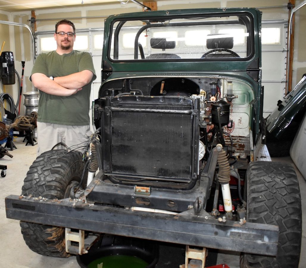 Early teardown — engine compartment opened, taking stock of the project
