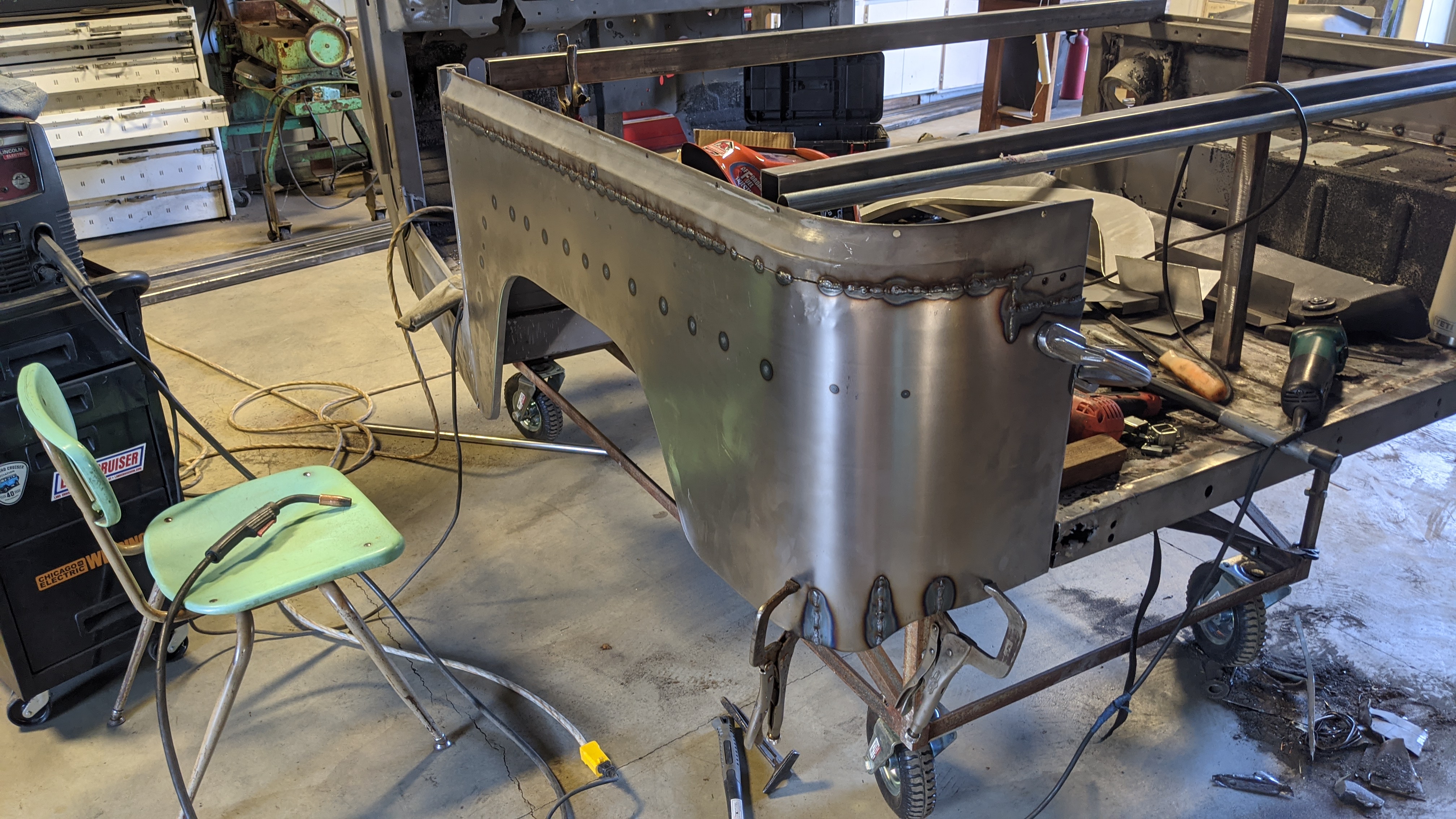 Body panels under repair — patched and prepped, no filler