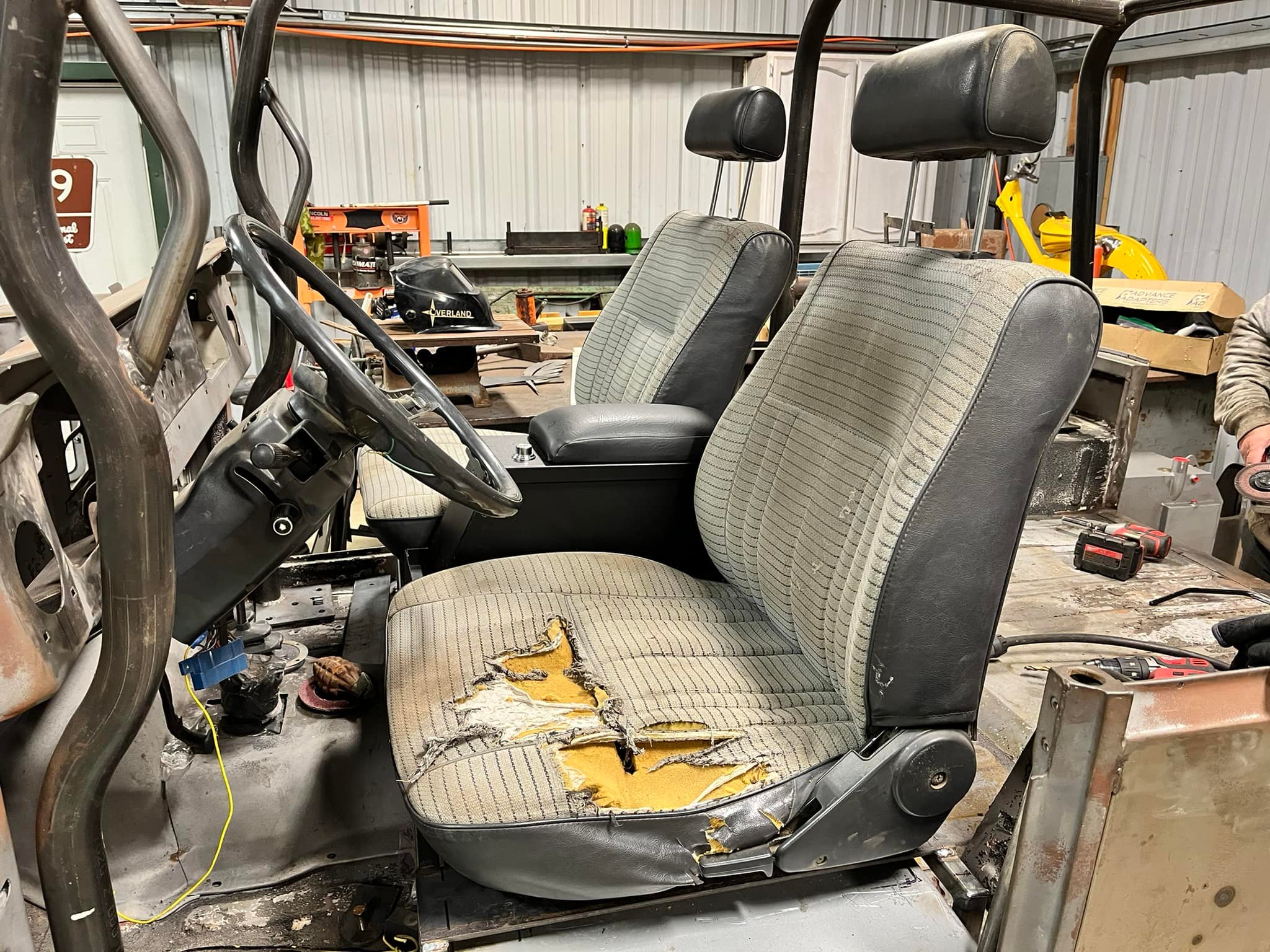 Interior in progress — FJ62 buckets and period-correct trim
